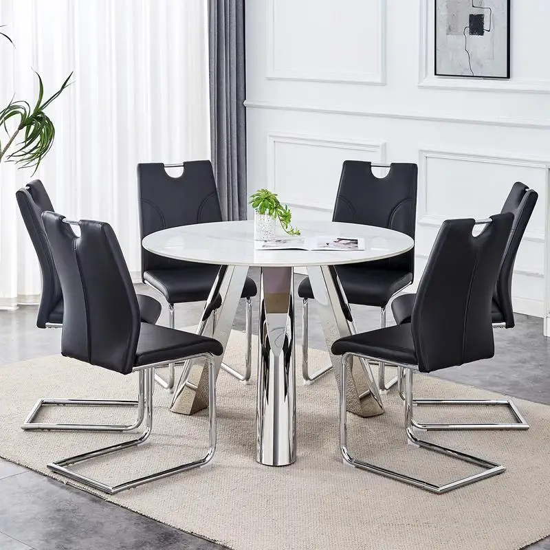 طاولة طعام مستديرة من الفولاذ المقاوم للصدأ مقاس 42 بوصة مع 6 كراسي سوداء فريدة من نوعها وأرجل فضية - سطح حجري متكلس، مثالية للحديث