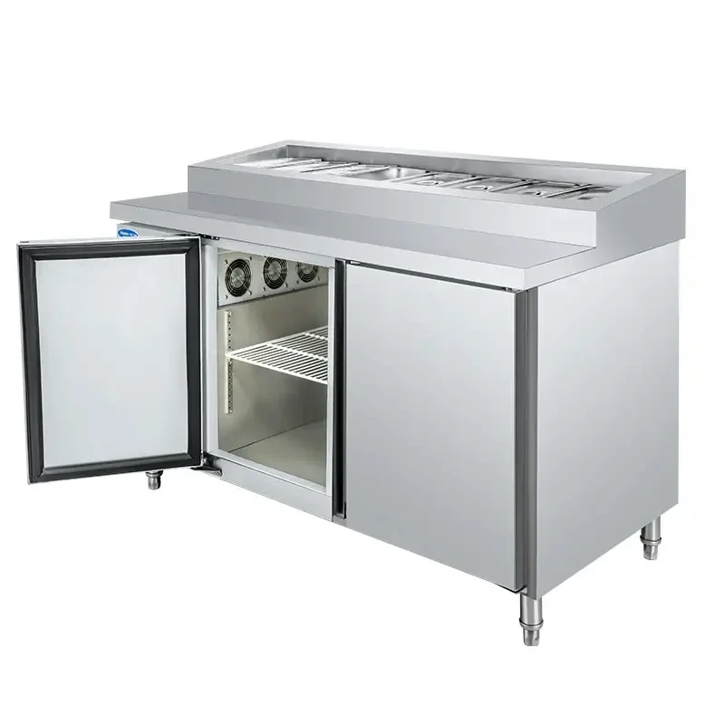 Commercial restaurant kitchen equipment, pizza preparation table, refrigerated pizza counter