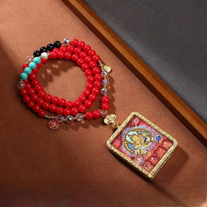 

Tibetan cultural ornament, yellow god of wealth, thangka pendant, hanging ornament, glass woven rope, handmade necklace