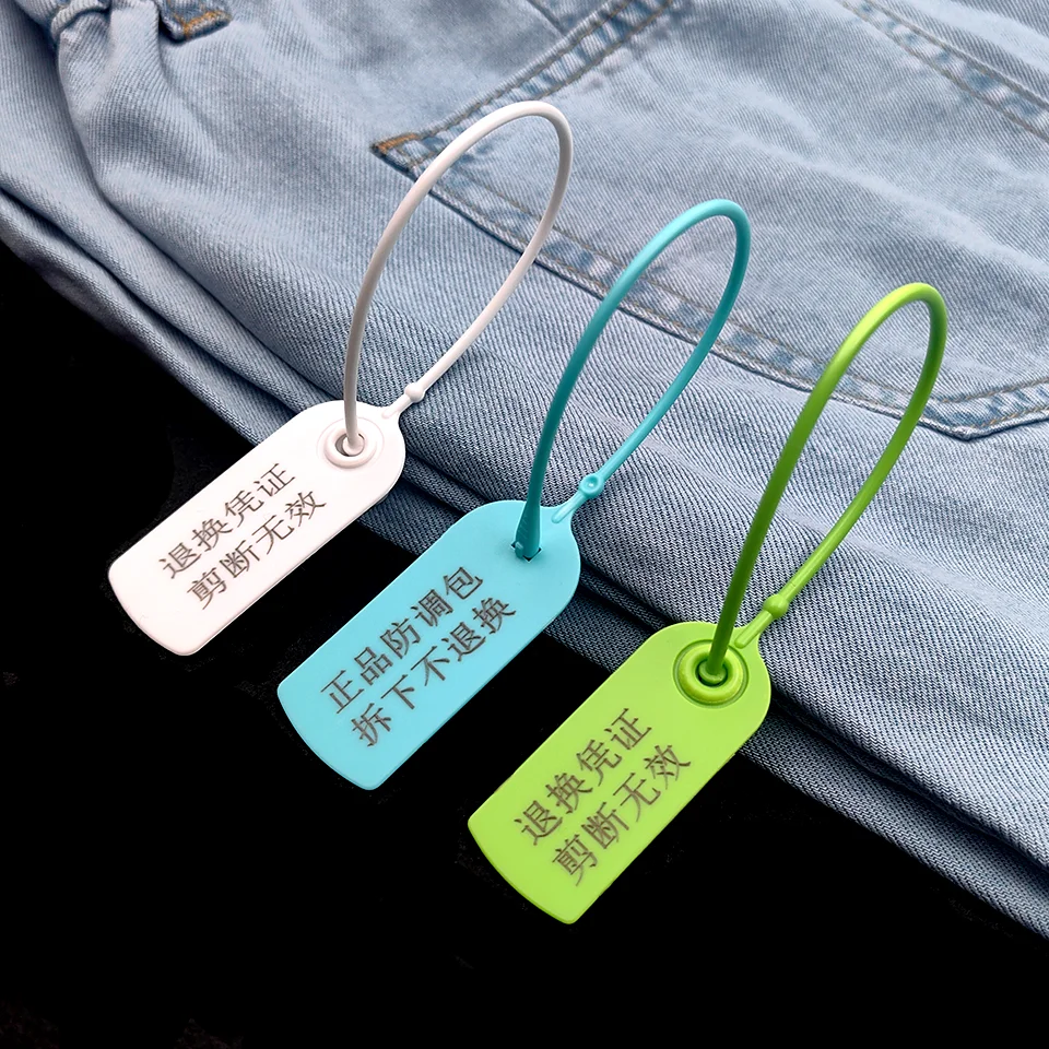 

Custom Logo Cheap Design Anti-theft Zip Tie Luggage Tag Luxury Plastic Seal Clothing Tagger Hang Tag