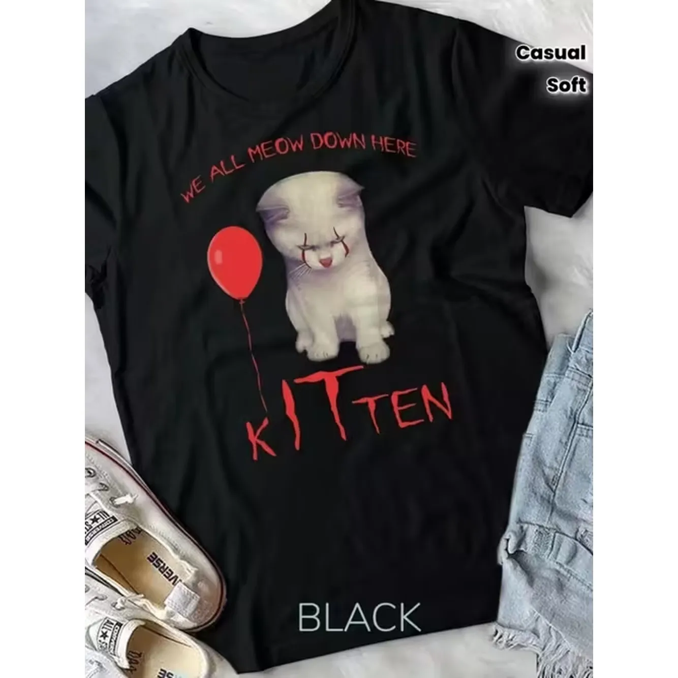 item picture a whimsical and graphic t shirt featuring a clown cat all here with red makeup and balloon this comfortable and casual black tee is ideal for cat and