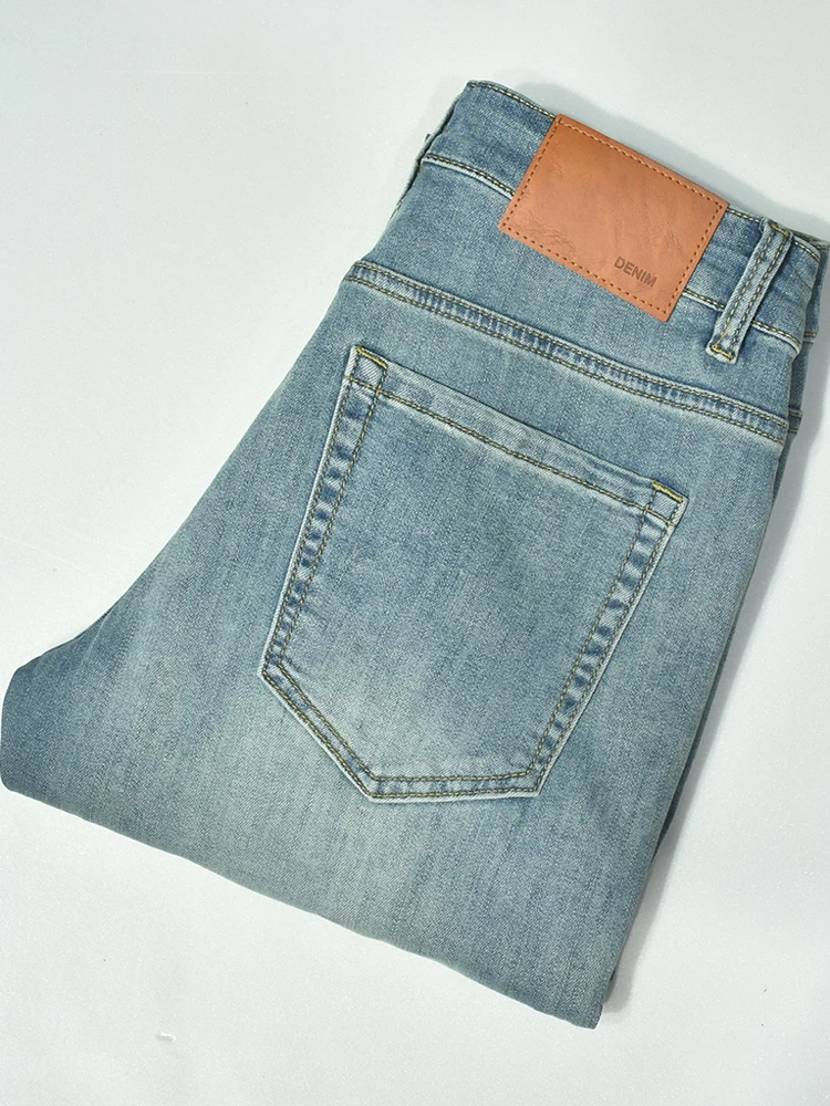 الرجعية الأمريكية Waed الضوء الأزرق مطاطا تسعة عشرات الرجال ضئيلة مستقيم رقيقة الدينيم الجينز العلامة التجارية العصرية عارضة القطن تمتد