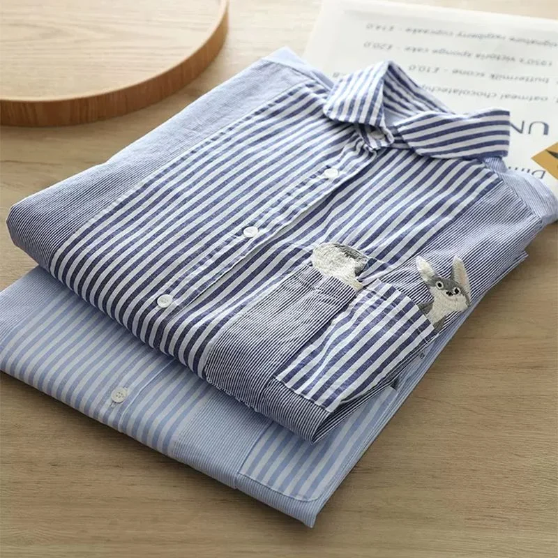 

2025 Autumn Women's New Blue White Striped Cartoon Embroidery Commuting Style Cotton Bottoming Long Sleeve Shirt
