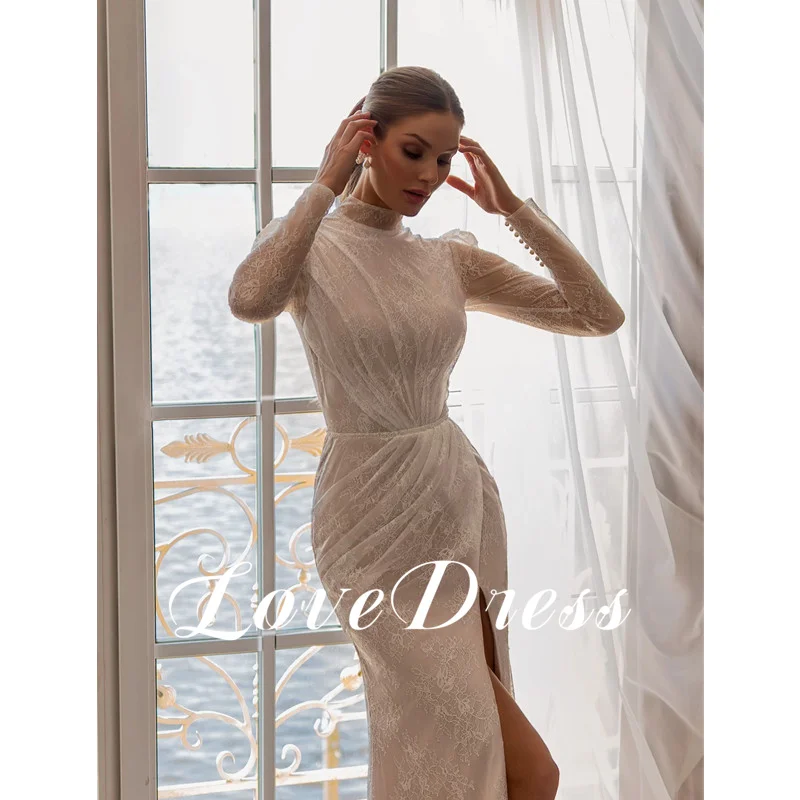 Love Modern Abito da sposa a sirena in pizzo con collo alto Abito da sposa avorio a maniche lunghe Abito da sposa sexy con spacco laterale alto Bottoni senza schienale Lunghezza pavimento