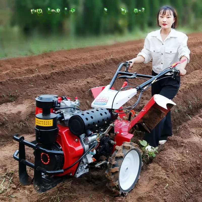 

Four-wheel drive micro-tiller New agricultural elderly plowing machine New diesel trenching small plowing multi-functional rota
