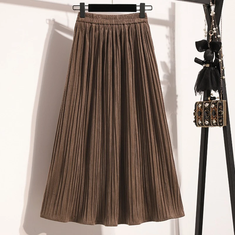 Versión coreana Otoño 2025 Invierno Falda plisada con cintura elástica falda de talla grande sólida de cintura alta de longitud media para mujer
