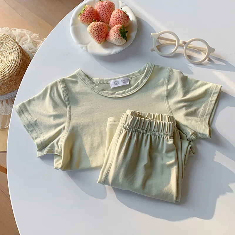 Children's home suit set, short sleeved pants, summer thin design, boys' and girls' pajamas, solid color air-conditioned suit