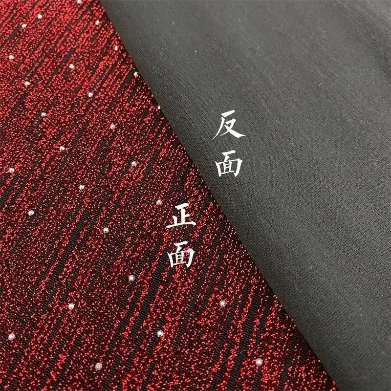 

Black glittering elastic fabric with silver gold threads and embedded diamonds for full length dress stage gown evening wear DIY