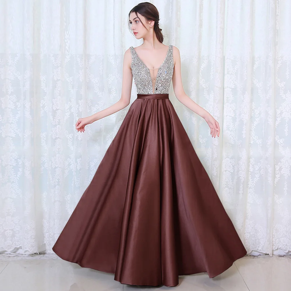 セクシーな手作りの深いVネックのイブニングドレス、ファッショナブルなミッドウエストAラインスカート、結婚式やパフォーマンスに適したポリエステル100%