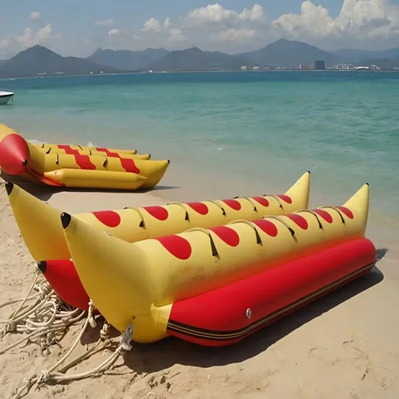 Inflatable banana boat, water flying fish, motorboat towing banana boat, sea rotating gyro