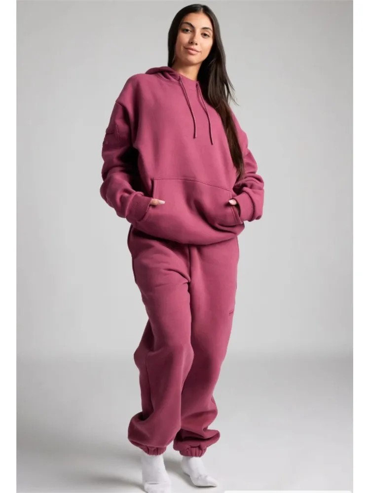 Set Dua Potong Longgar Saku Kasual Baru Musim Gugur Musim Dingin 2025 Set Celana Hoodie Sweter Lengan Panjang Warna Solid Wanita Pakaian Jalanan