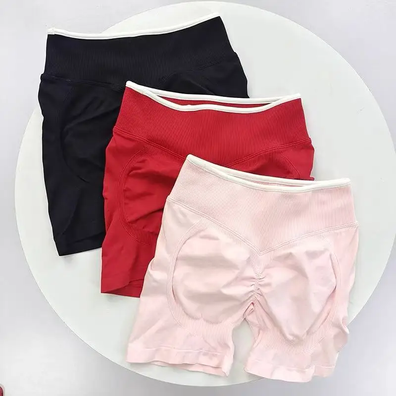Sport- und Fitnessanzug Weste Kontrastfarben Stoßdämpfender Sport-BH Hochgeschnittene Atmungsaktive Peach-Hip Dreiteilige Shorts-Set – Detail 24
