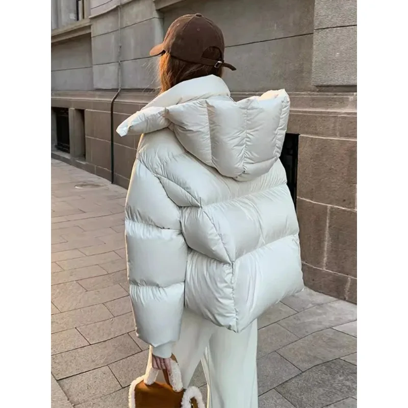 Verdikte donsjas 2025, winter nieuwe high-end mode, bladerdeegbroodpak met capuchon, losse effen damesdonsjas