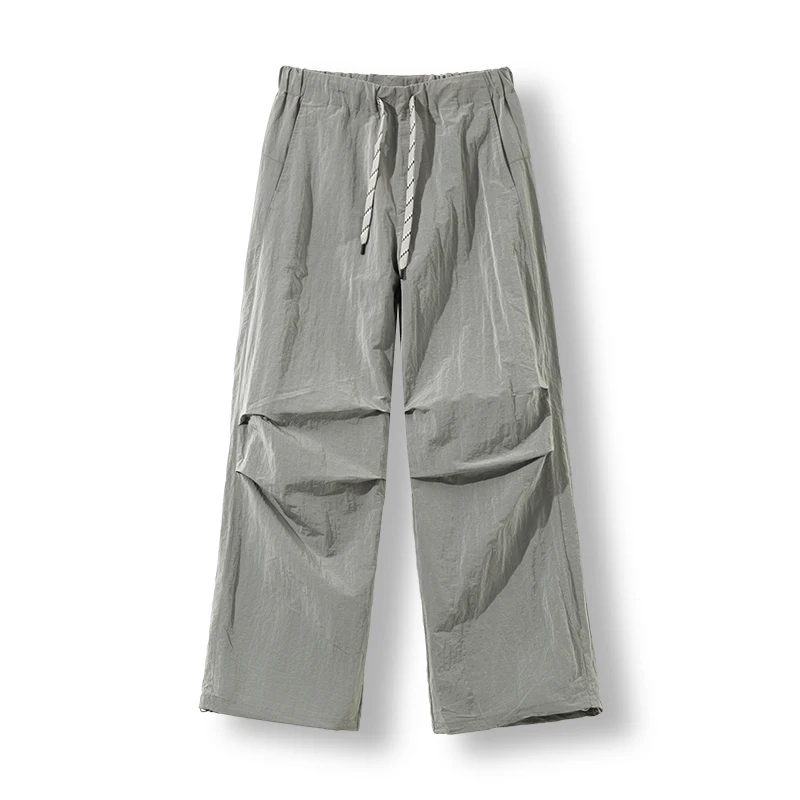 

Мужская весенняя новая коллекция 2025: свободные, простые и универсальные повседневные брюки, спортивные спортивные штаны и повседневные брюки-зонтики.