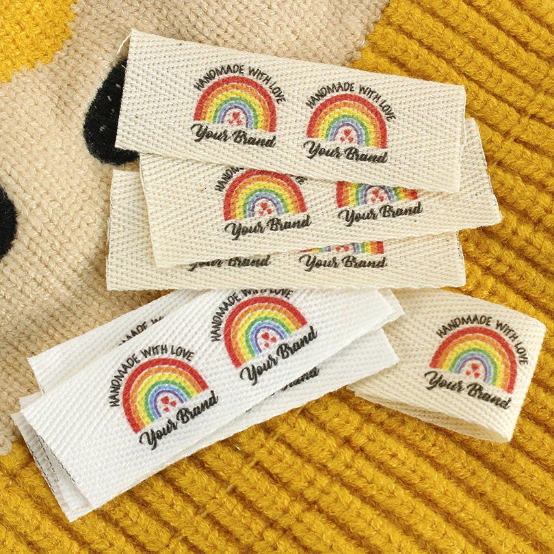 Benutzerdefinierte Stoffetiketten, faltbare Twill-Etiketten, Logo-Etiketten, Nähzubehör, Farbbandetiketten, Etiketten für Kleidung, Regenbogen-Tags, XW3513