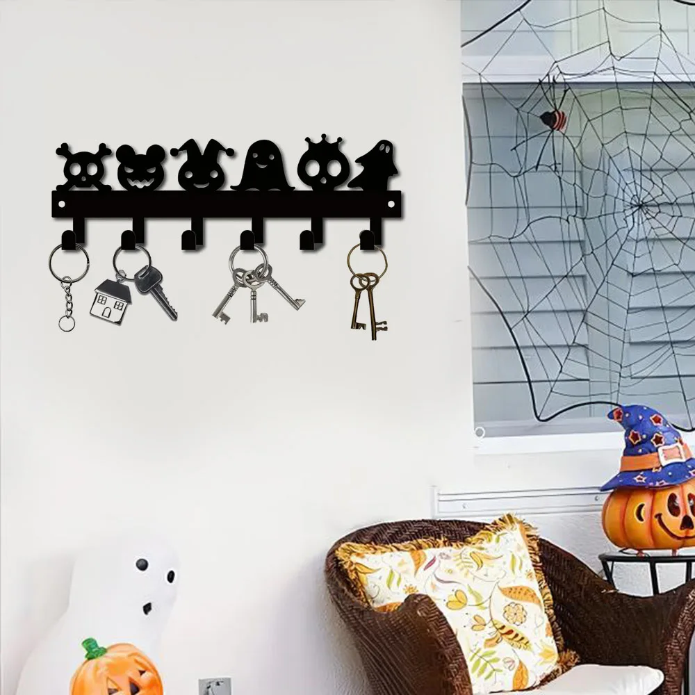 

Delightful Halloween Metal Wall Holder: Pumpkin Ghost Pattern Hooks for Keys, Towels, and Umbrellas. A Organizer Rack.