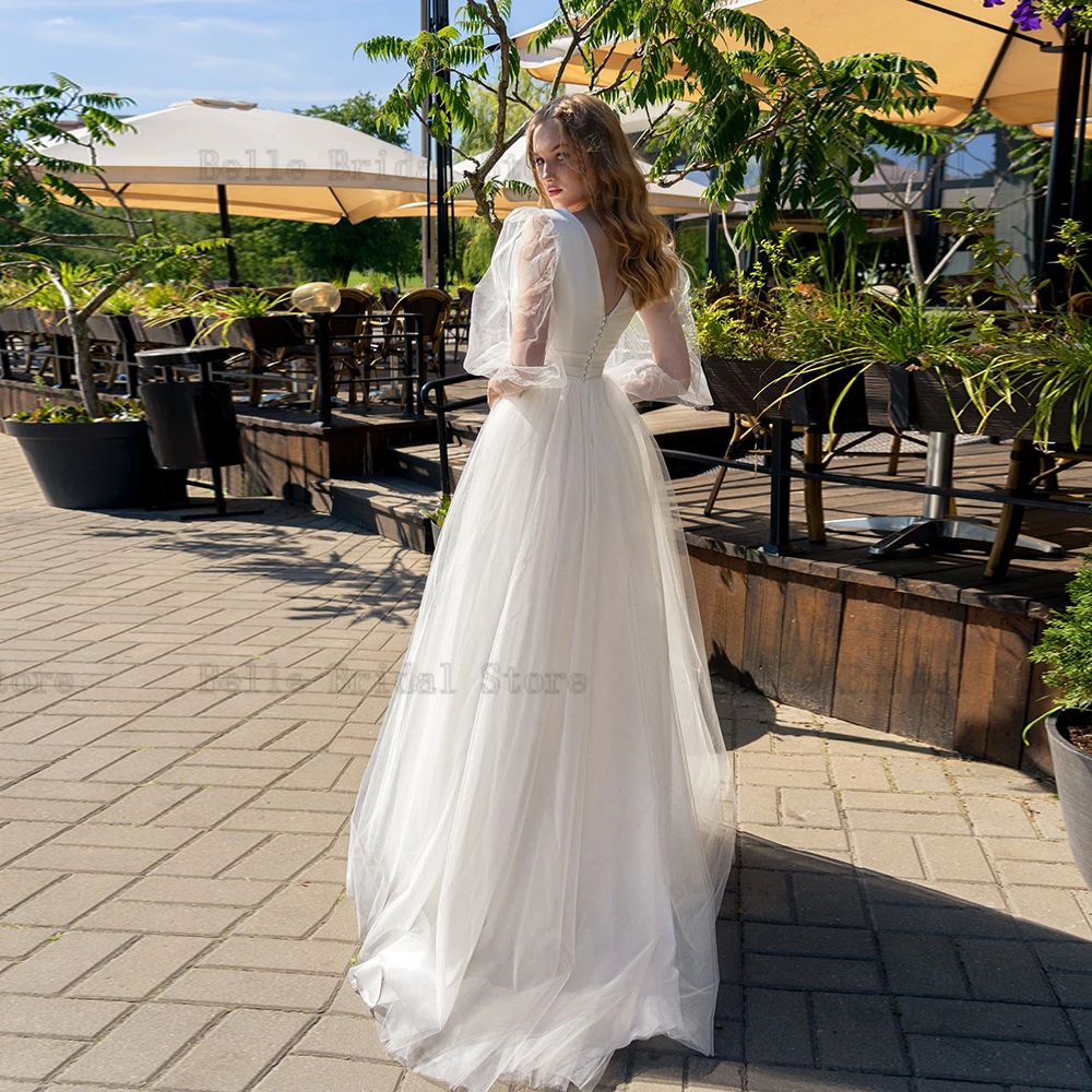 Vestidos de novia elegantes de tul con cuello en V, mangas largas, línea A, apliques plisados, botón trasero, tren de barrido