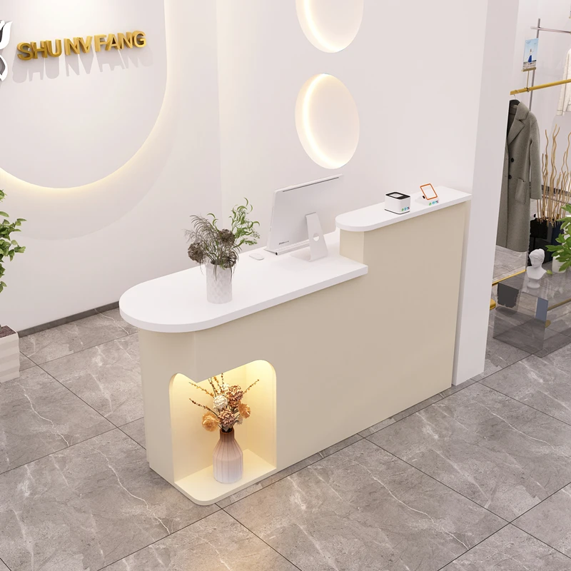 

Касса Стойка регистрации Стойка регистрации Парикмахерская Бизнес Современные стойки регистрации L-образный белый Mostrador Recepcion Офисная мебель