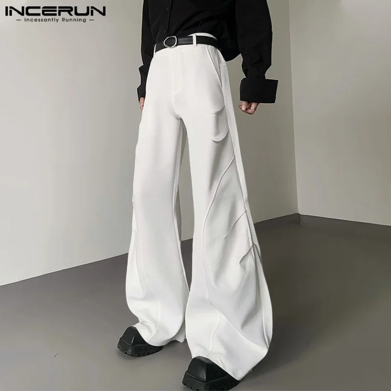 INCERUN Męskie Spodnie Jednolitego Koloru Zapinane na Guziki Joggersy Luźne Casualowe Spodnie z Plisami Męska Moda Streetwearowa Wygodne Spodnie Rozszerzane S-5XL