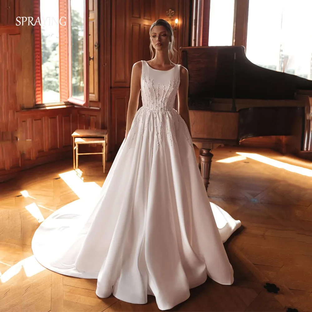 ชุดแต่งงานเจ้าสาวแบบใหม่ คอวี แขนกุด ประดับมุก ทรงเอไลน์ ชายกระโปรงยาวลากพื้น สามารถสั่งตัดได้