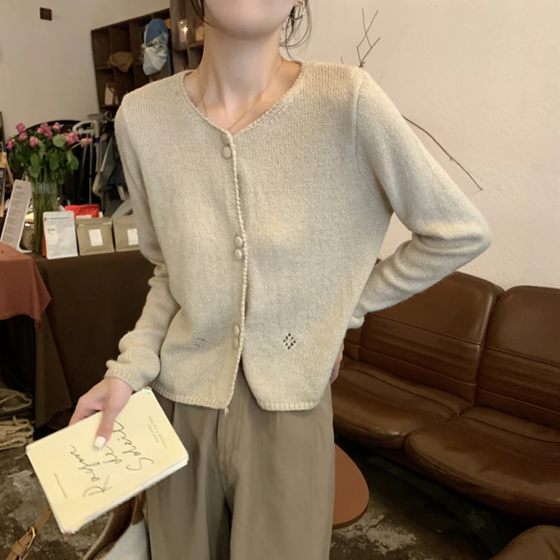 Autunno inverno moda solido girocollo manica lunga maglioni abbigliamento donna dolce bottoni vuoti maglia protezione solare Cardigan