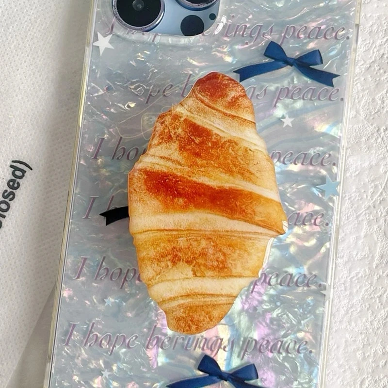Soporte de Croissant de dibujos animados para teléfono, accesorio Universal para dedo, para iPhone 15, 16, Samsung