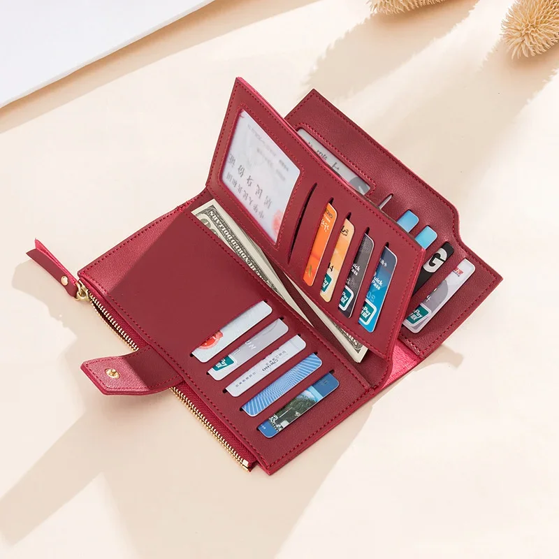 

Simple solid color women's wallet Korean version multifunctional large capacity three fold wallet zipper buckle PU hand-held bag