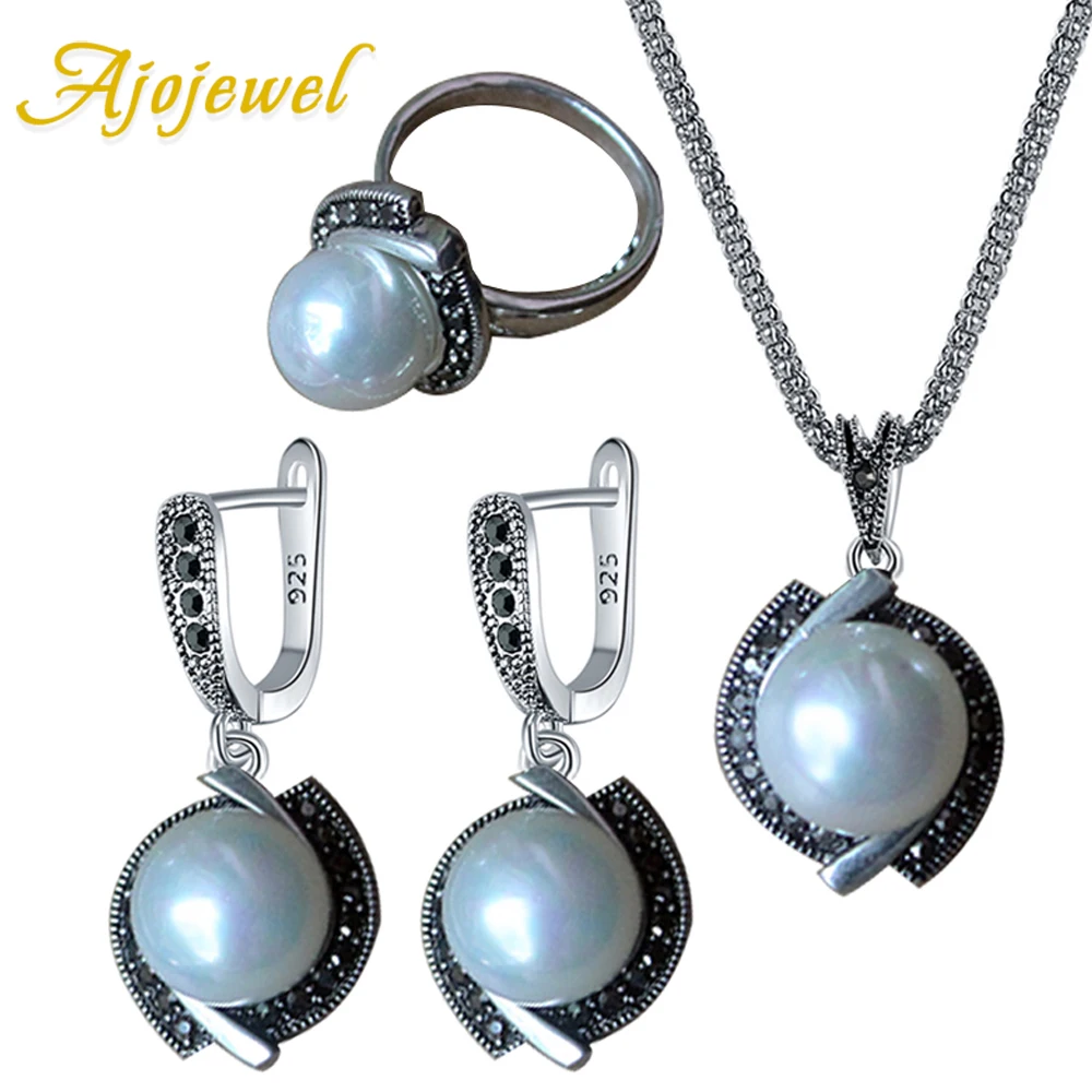 

Ajojewel Black CZ Cyclone Style Jewelry Woman Simulated Pearl Earrings Necklace Ring Set Wholesale Vintage Accessories Items