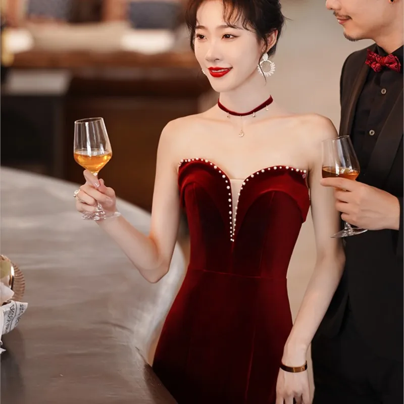 

Fishtail toasting with a new Burgundy strapless dress