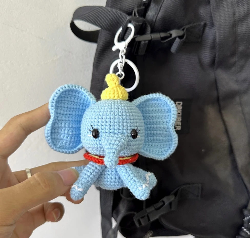 

DIY handmade Dumbo doll crocheted wool knitting material bag elephant keychain pendant as a gift for friends