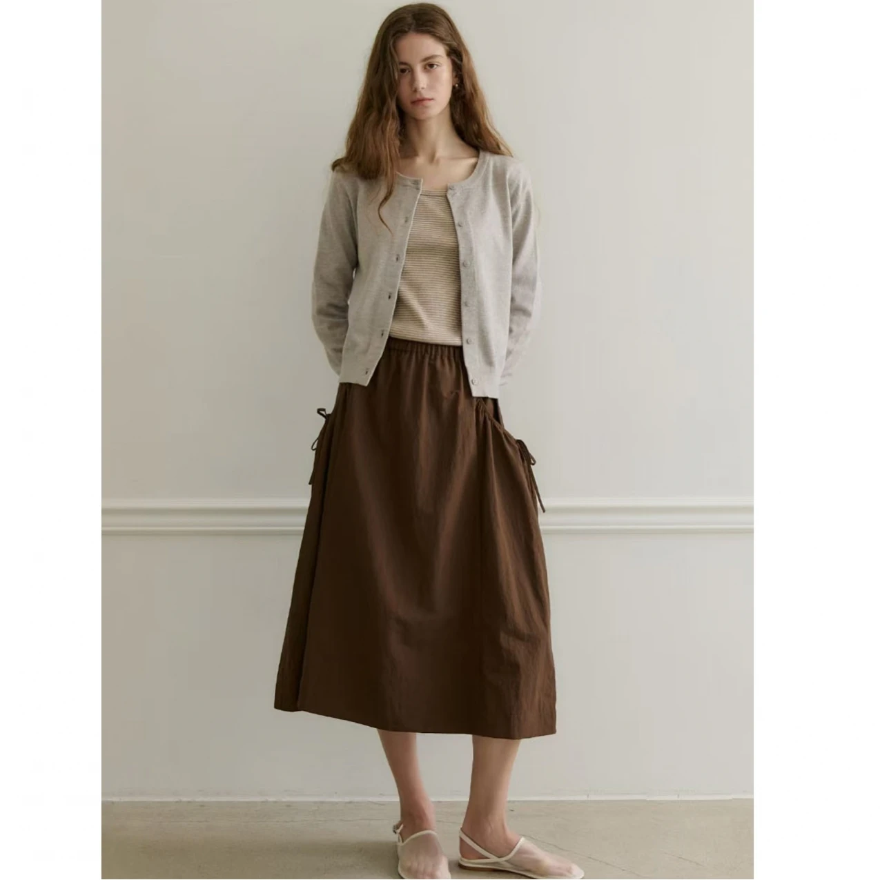 

Юбка-трапеция MICOAT Pure Flavor с эластичным поясом и плиссировкой, женская, из ПВХ-ткани, осень 2025