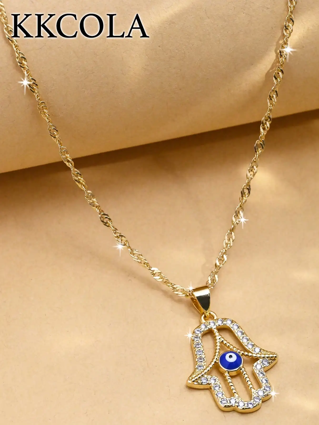 

Gold-Tone Hamsa Hand Pendant Necklace with Blue Evil Eye and Crystal Accents