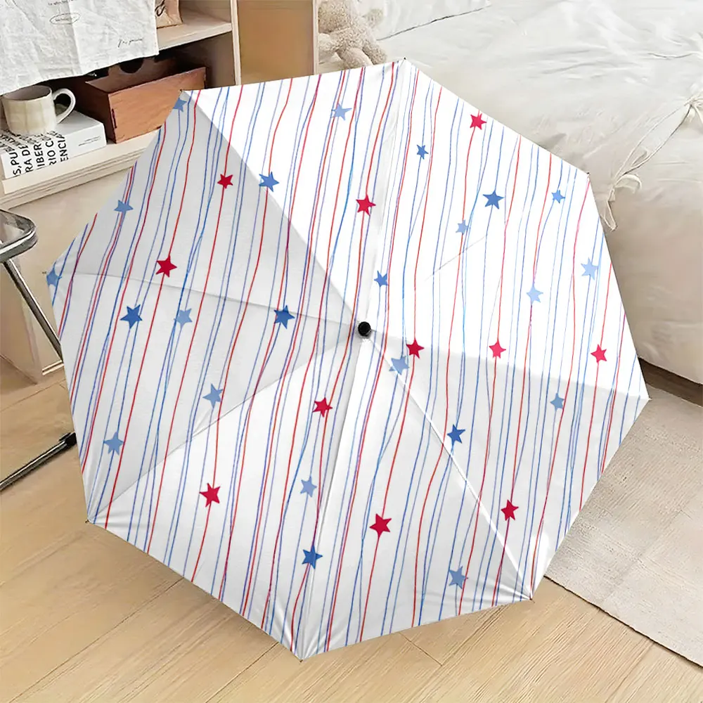 parapluie-blanc-a-rayures-orne-d’etoiles-rouges-et-bleues-portable-impermeable-ideal-pour-se-proteger-du-soleil-et-de-la-pluie-lors-de-vos-deplacements-en-exterieur-ou-a-la-plage