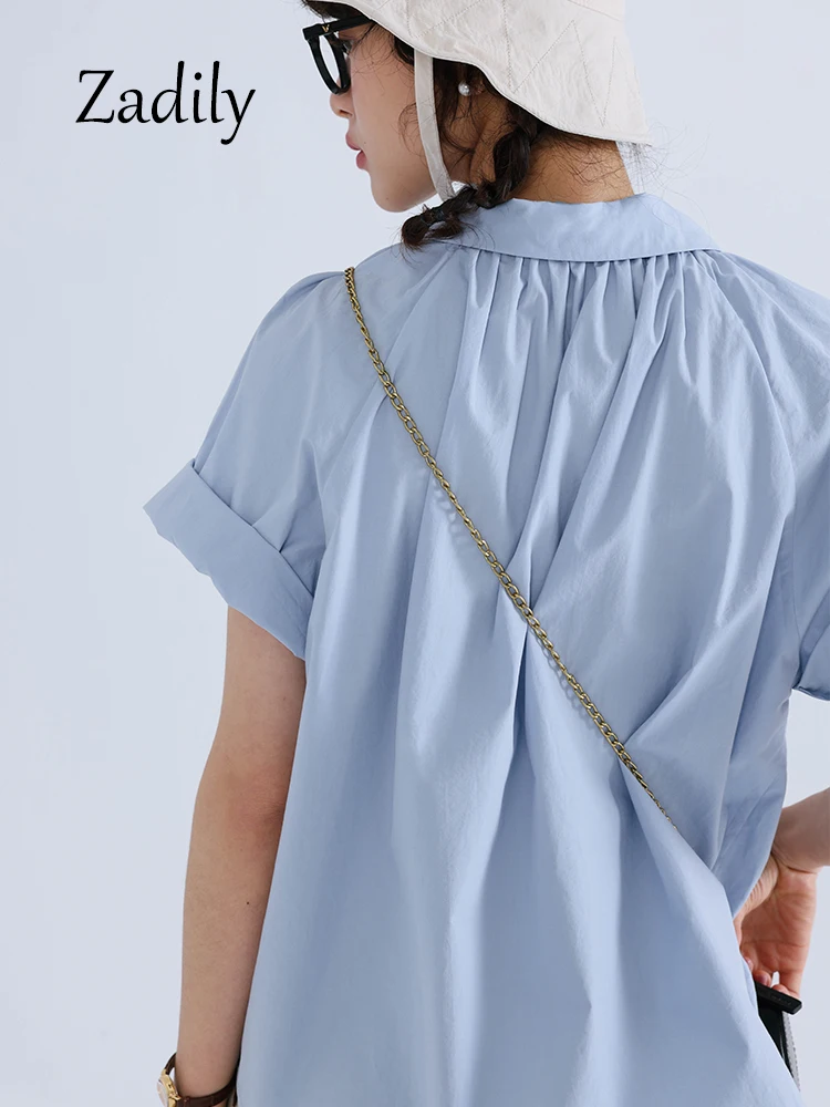 Zadily-Blusa de manga raglán corta para mujer, camisa blanca de algodón, estilo coreano, con pliegues y botones, para el trabajo, verano, 2023