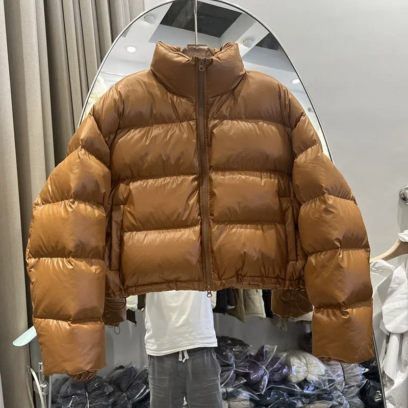 2025 hiver blanc canard vers le bas court femmes doudoune pardessus mode chaud col montant ample couleur unie femmes doudoune