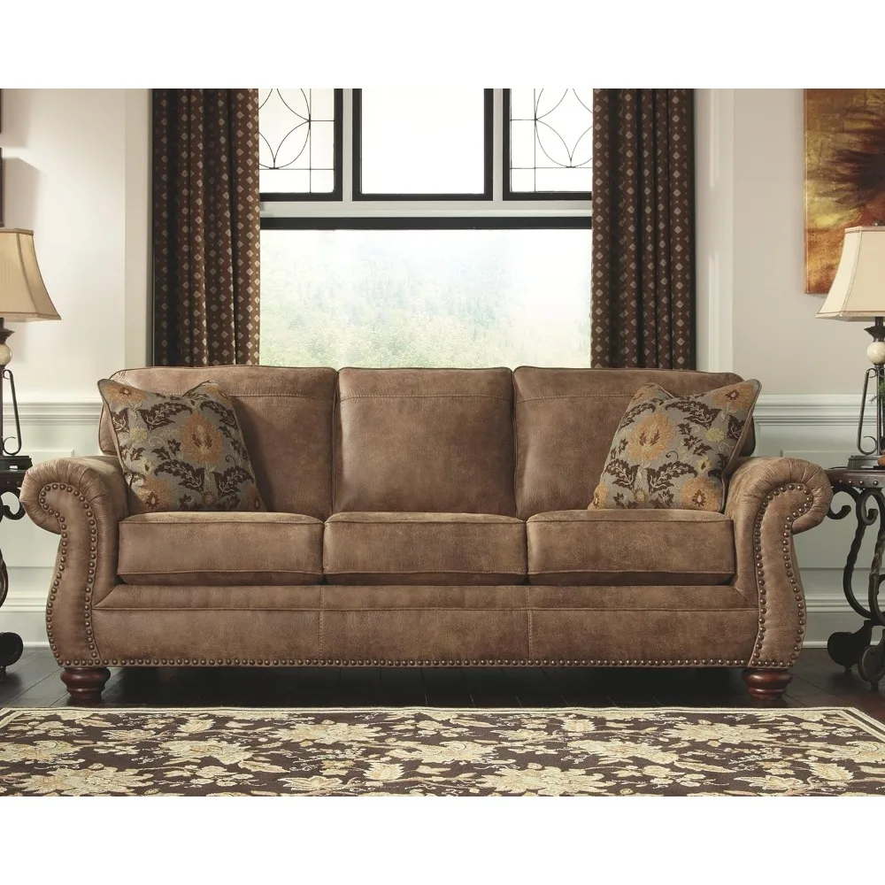 Larkinhurst Faux Leather Sofa with Nailhead Trim and 2 Accent Pillows, Brown