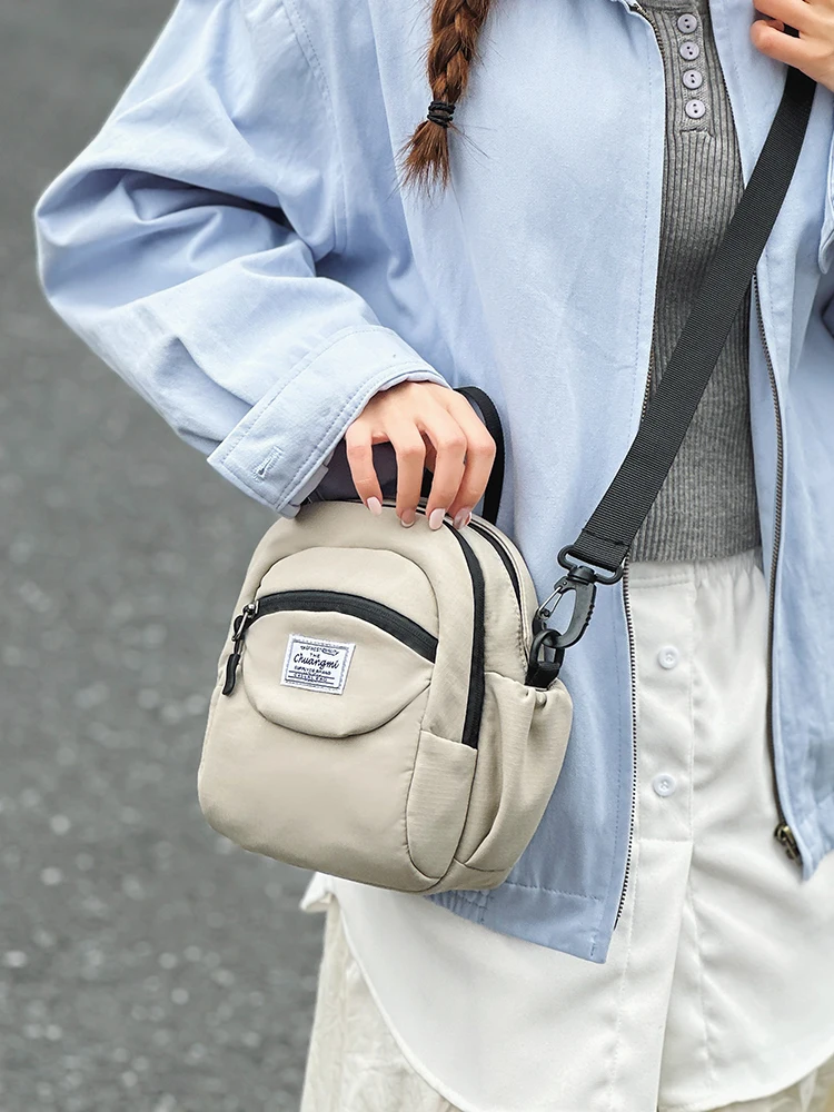 トレンディな多層カジュアルクロスボディバッグ、軽量ハンドバッグ、ストリートスタイル、ファッショナブルな小型ポーチ、男女兼用