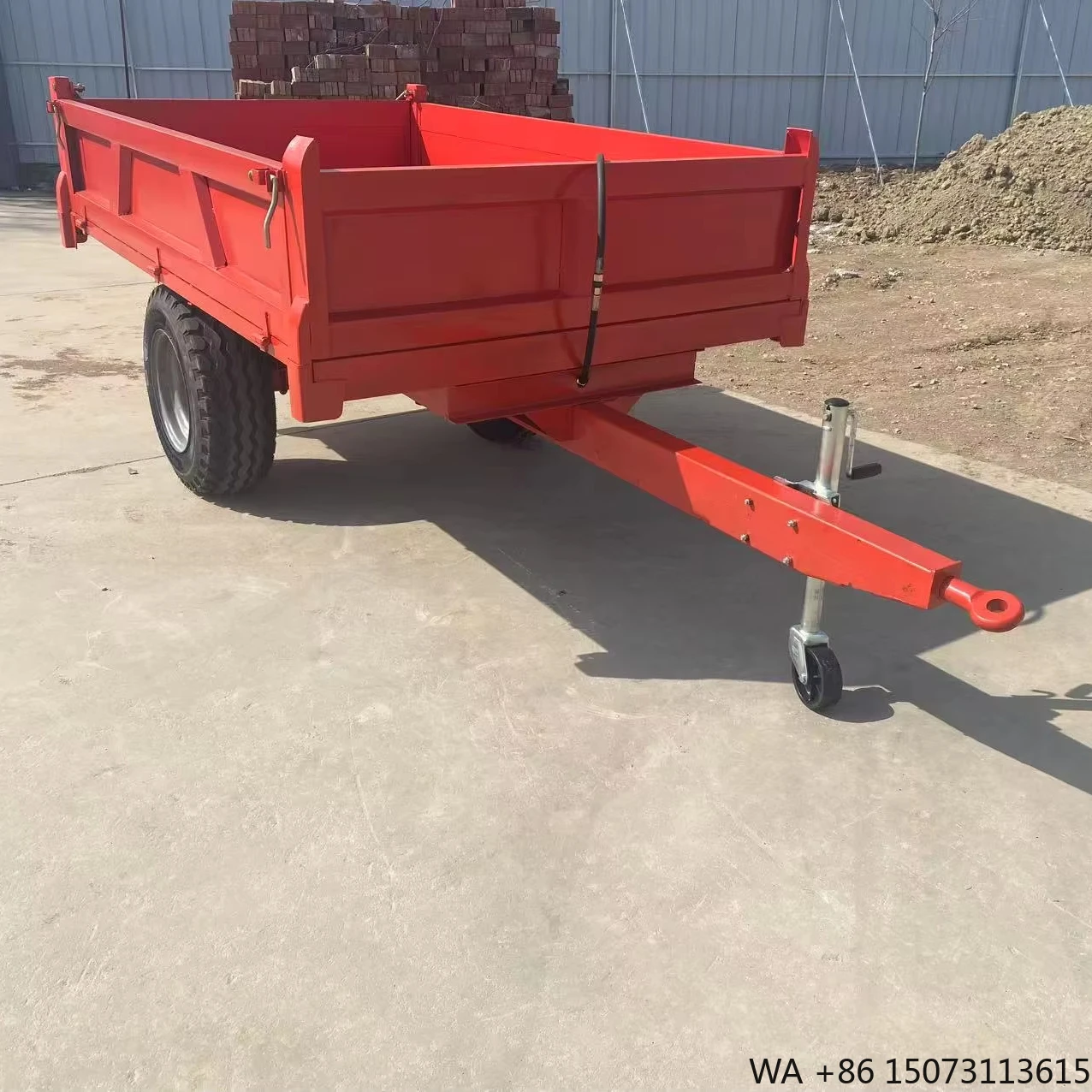 

Multi-Functional Agricultural Trailer with Wear-Resistant Tires for Livestock Transport on Gravel Roads