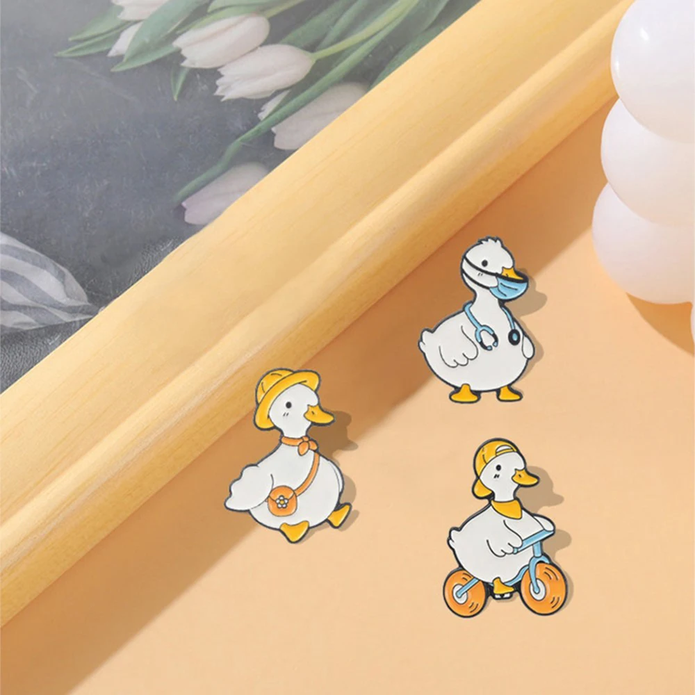 Lovely Animal Enamel Pin Custom Goose Duck Shopping Swim Cycling Brooch Bag Lapel Pin Cartoon Funny Badge Jewelry Gift for Kid