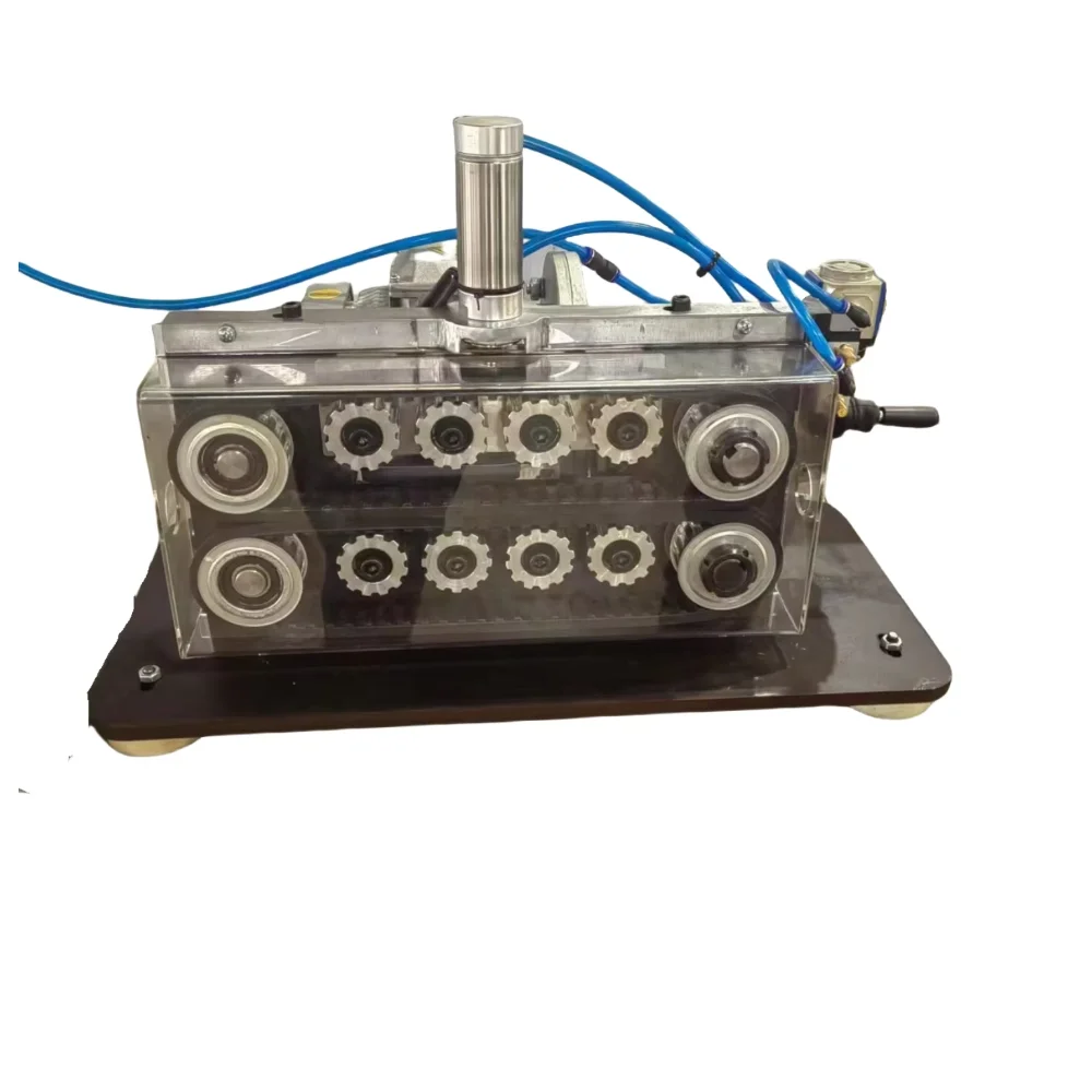 

Pre-aligned belt tractor feed toothed belt drive roller
