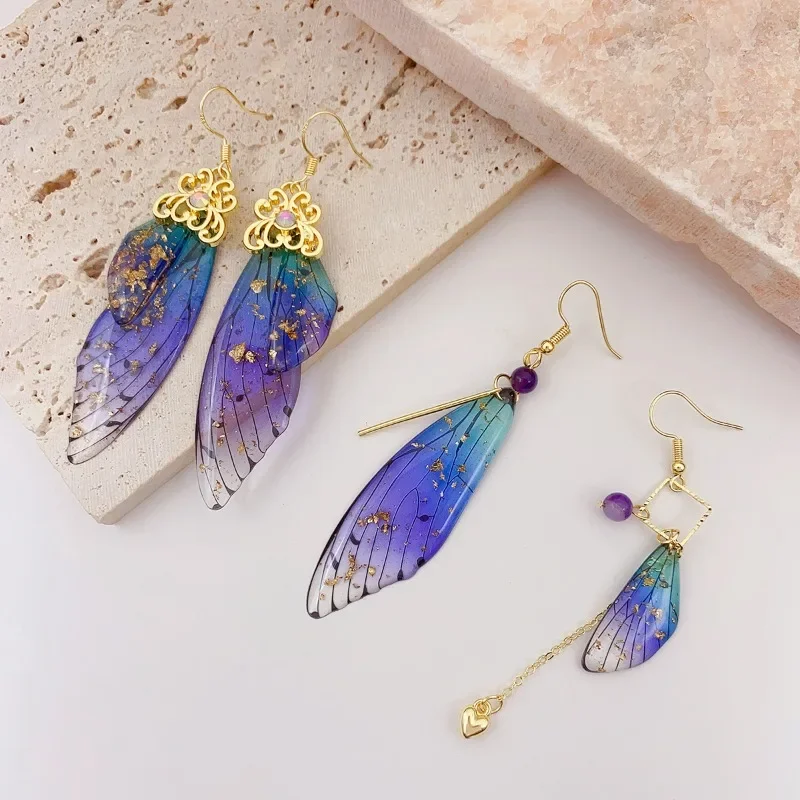 Minar Fantasy Shiny Flake Rhinestone Clear Blue Resin Asymmetric Butterfly Wings Drop Earrings for Women Gold Metal Jewelry