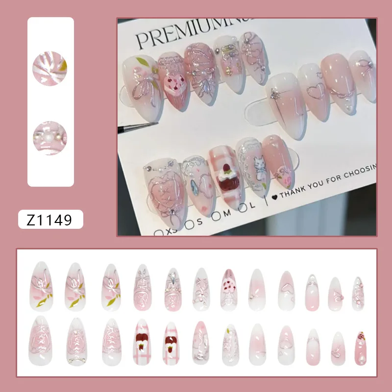 

24PCS Almond False Nails Pink Blush Gradient French Tip with Cute Graffiti Heart Silver Patterns Pearl Decor Glue on Fake Nails