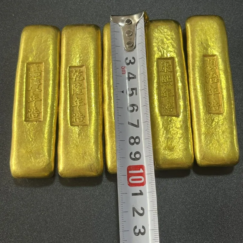Small yellow fish, ancient bars, , ingots, bricks, gold coins, brass, collectibles, genuine antiques