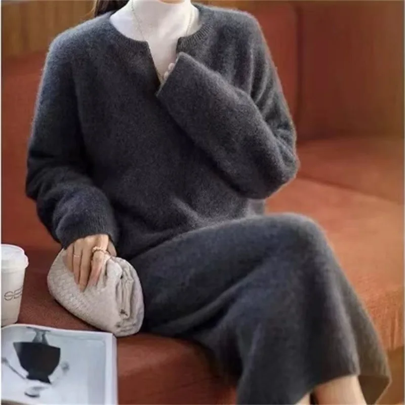 Autumn and winter new fashionable knitted women's clothing V-neck loose knitted sweater+half skirt two-piece set
