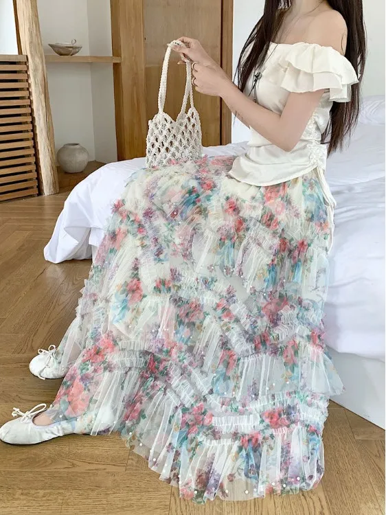 Perlenbesetzte unregelmäßige hohe Taille Rüschen Blumenröcke weiblich 2025, Sommer, Reisen, Urlaub, Datum, Party, knielanger Rock mit Blumendruck