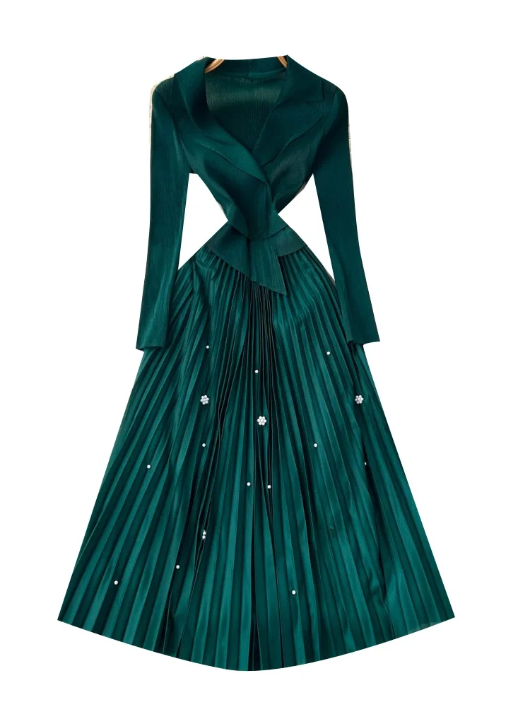 Długi płaszcz z perłowymi zdobieniami i stójką dla kobiet, spódnica w kształcie litery A z wysokim stanem, elegancki styl do pracy.