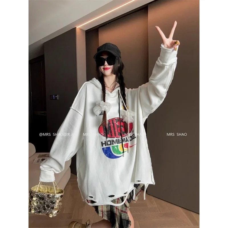 Felpa stampata a maniche lunghe con cappuccio casual allentata alla moda per le donne Top pullover di fascia alta autunno e inverno