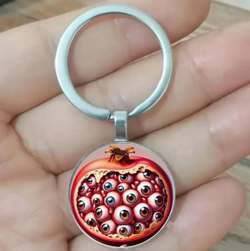 

Bright pomegranate and third eye charm keychain - with cartoon and plant themes, punk style, ladies' keychain, perfect for Chris