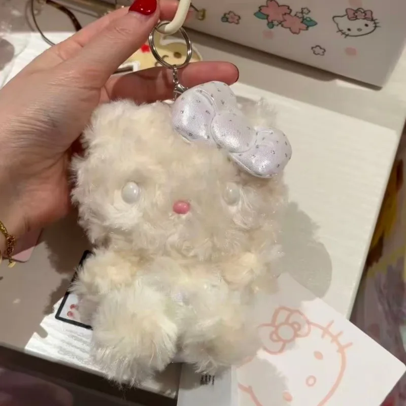 พวงกุญแจตุ๊กตาเฮลโลคิตตี้ขนฟูสีขาวแบบอเมริกัน ของเล่นตุ๊กตาแมวคิตตี้สำหรับกระเป๋าเป้สะพายหลัง