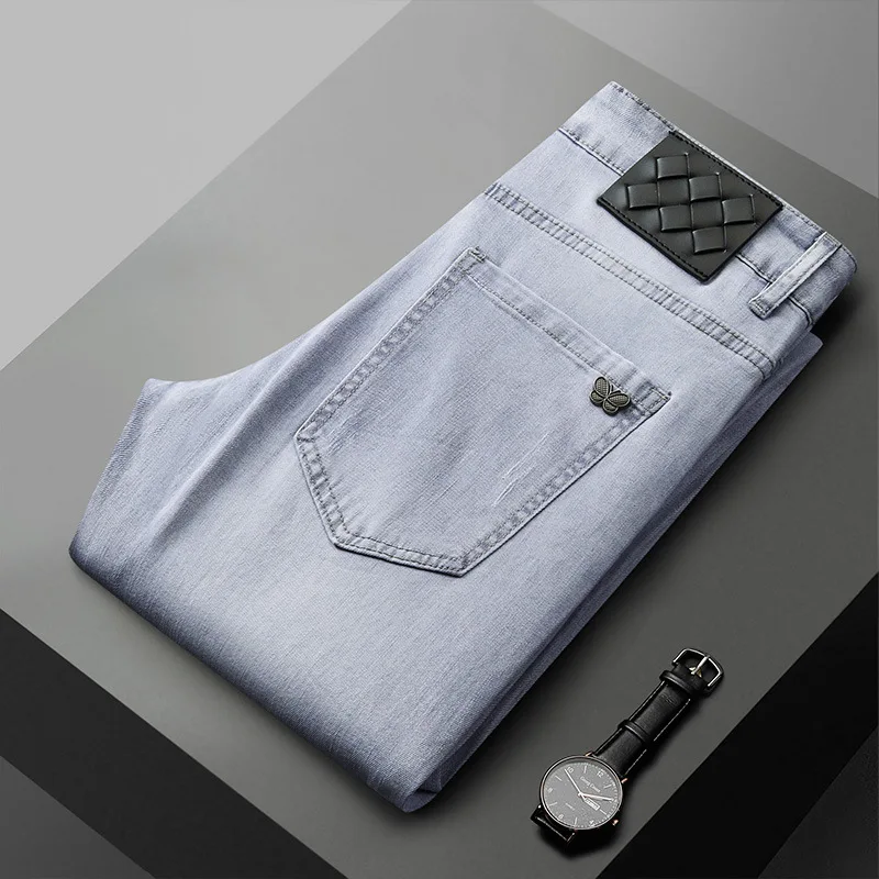 High-End erschwing liche Luxus Jeans Herren neue Mode trend ige schlanke gerade Sommer dünne Stretch Business Freizeit hose